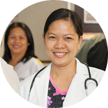 smiling nurse wearing a stethoscope